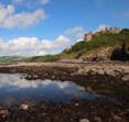 ayrshire coast with castle in hill