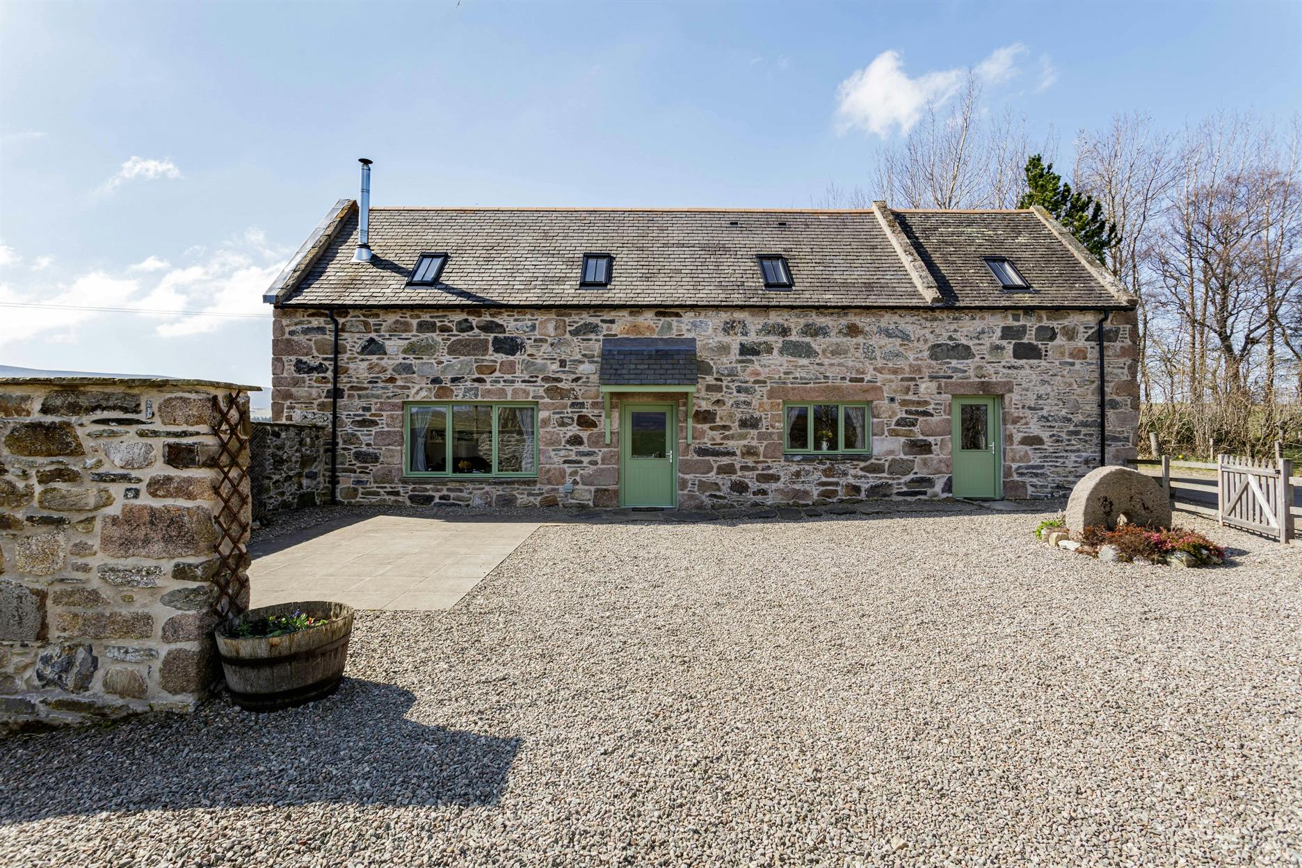 Front view of Auchnascraw Mill renovated stone self-catering holiday house