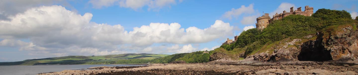 wide angle of ayrshire coast and castle on hill