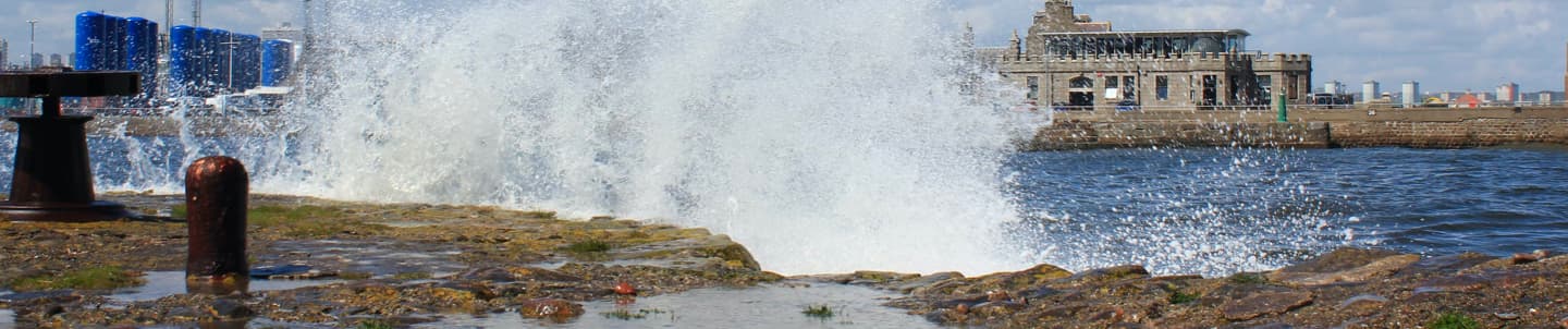 waves crashing against aberdeen shore