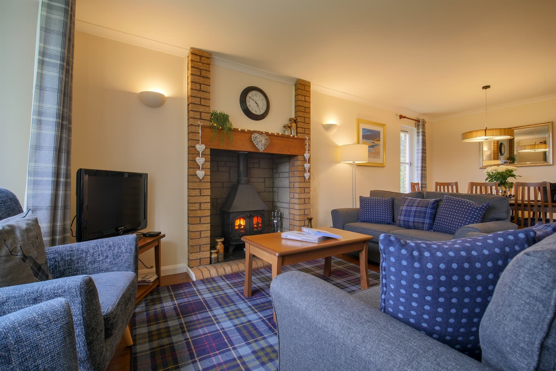 Living/dinning room with fire