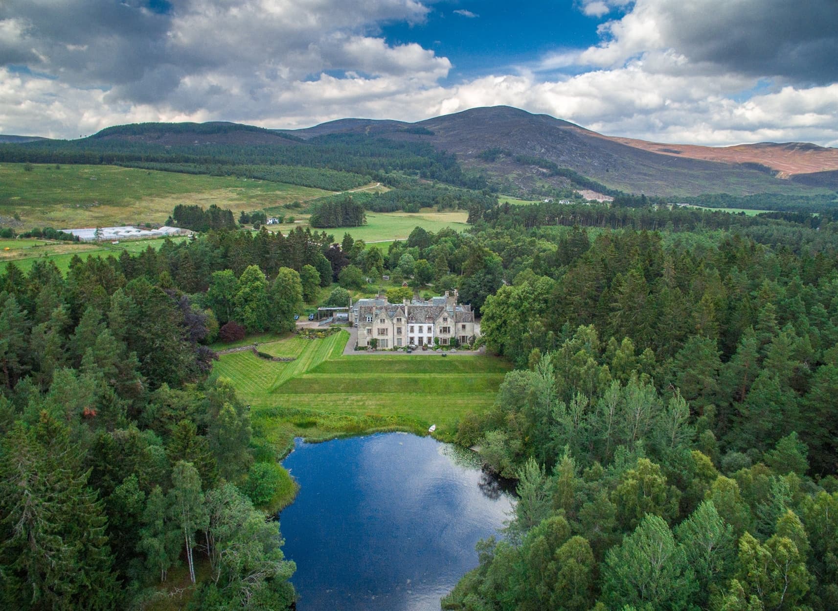 Drone footage of Alvie House towards the hills