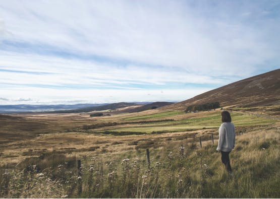 person enjoying view over cairngorms national park
