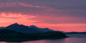 sunset over loch in scotland